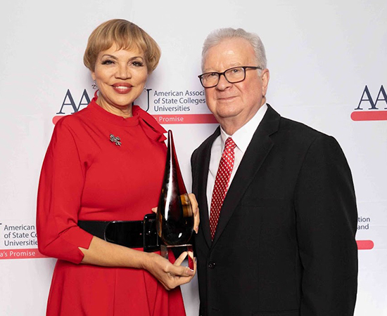 2023 DAA recipient Claire Babineaux-Fontenot With President Joseph Savoie of University of Louisiana at Lafayette. Photo by Rhonda Nunn.