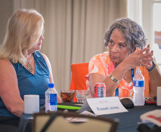 Britt Rios-Ellis and Bonita Durand confer at NPA 2024.